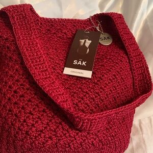 Red small tote from The Sak.